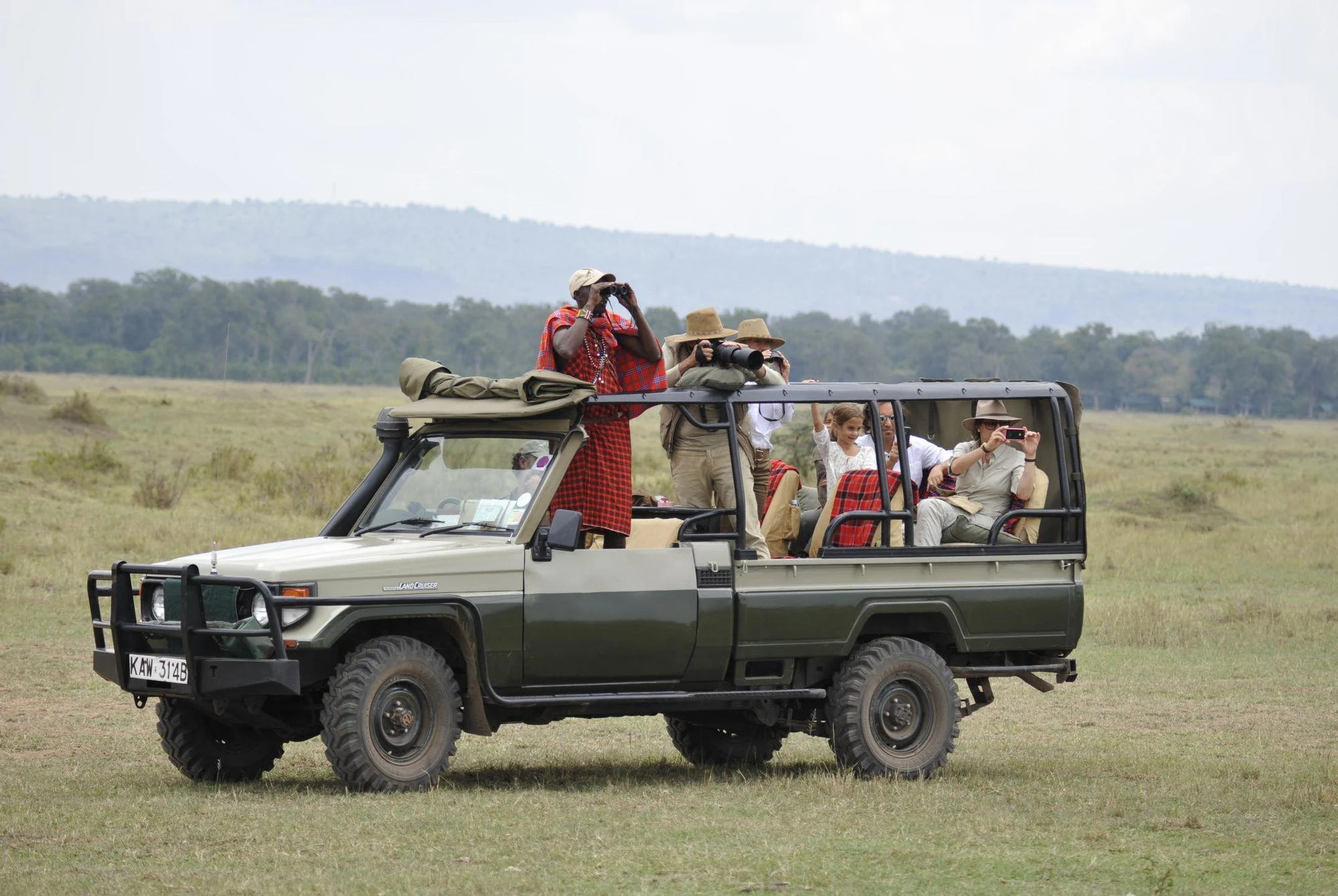 4x4 Land Cruiser viewing wildlife in the Maasai Mara Kenya