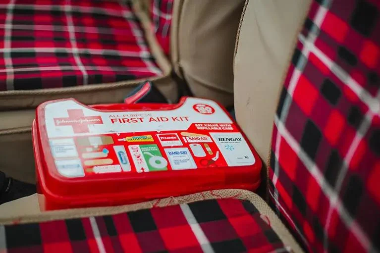 Personal travel first aid kit packed with essential health supplies for a Kenya safari