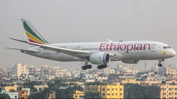 Ethiopian Airlines passenger aircraft flying in the sky representing budget connecting flights from the UK to Nairobi Jomo Kenyatta International Airport