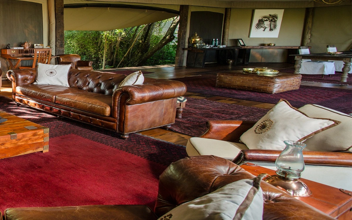 Luxury tented suites at Mara Plains Camp along the Ntiakitiak River in Olare Motorogi Conservancy.
